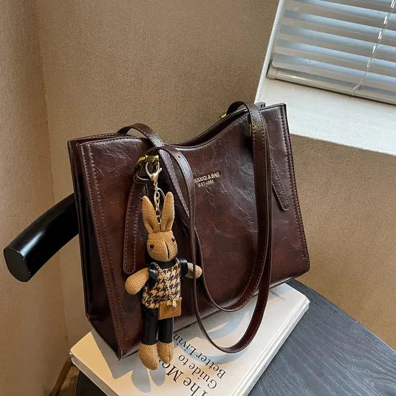Mirella | Bolso con dijes