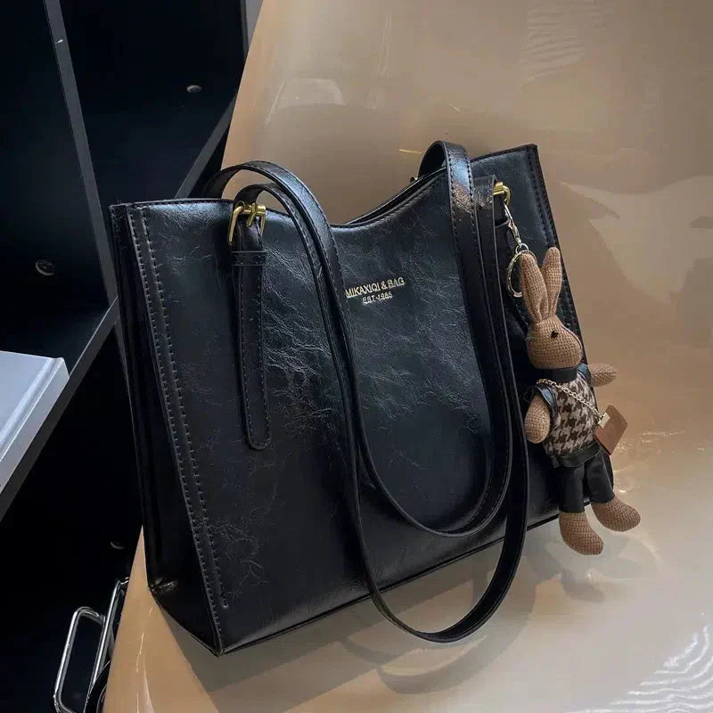 Mirella | Bolso con dijes