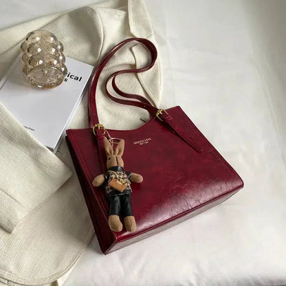 Mirella | Bolso con dijes