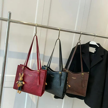 Mirella | Bolso con dijes