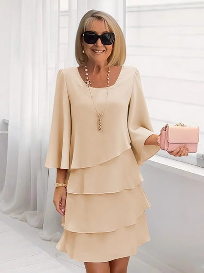 Andrea – Vestido elegante con volantes