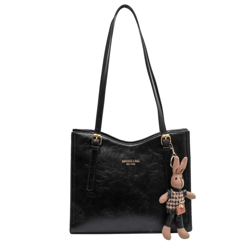 Mirella | Bolso con dijes