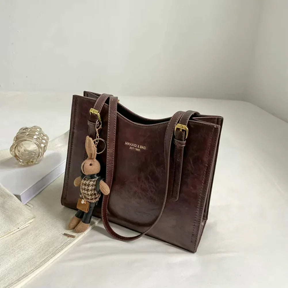 Mirella | Bolso con dijes
