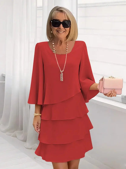 Andrea – Vestido elegante con volantes