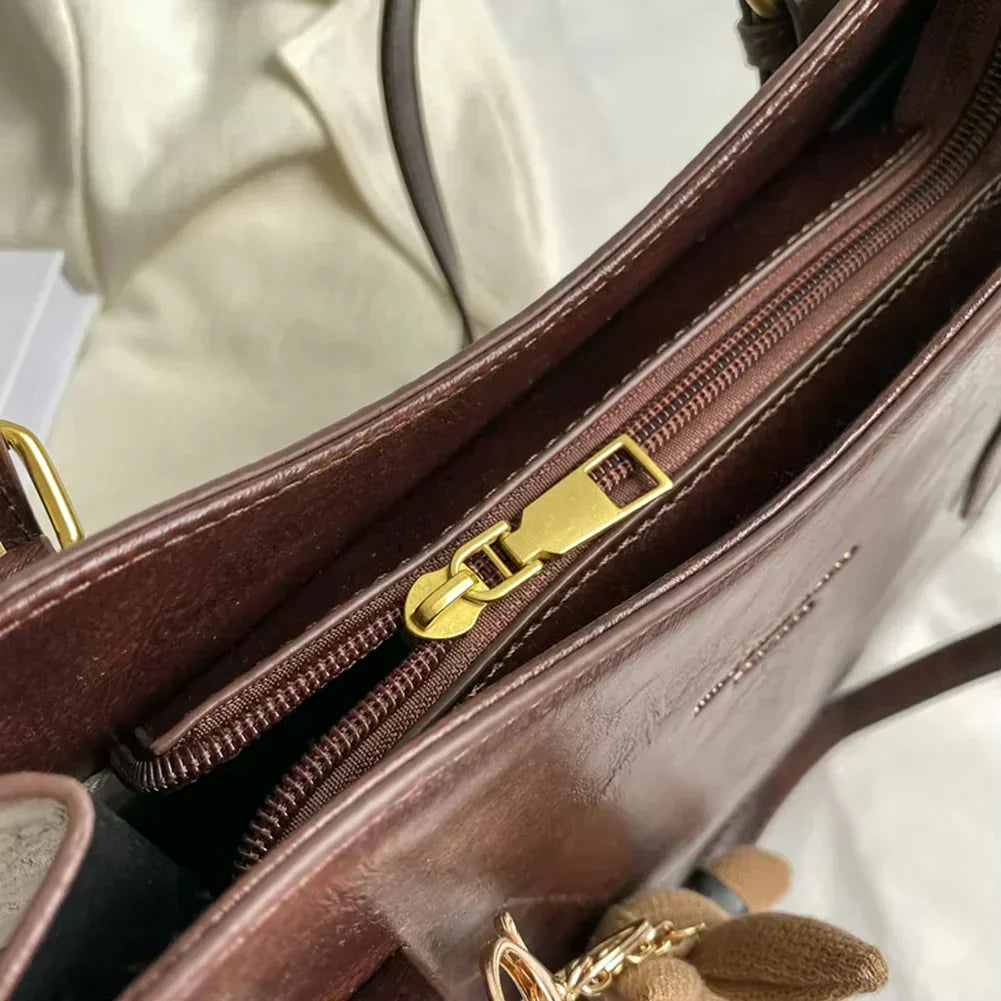 Mirella | Bolso con dijes